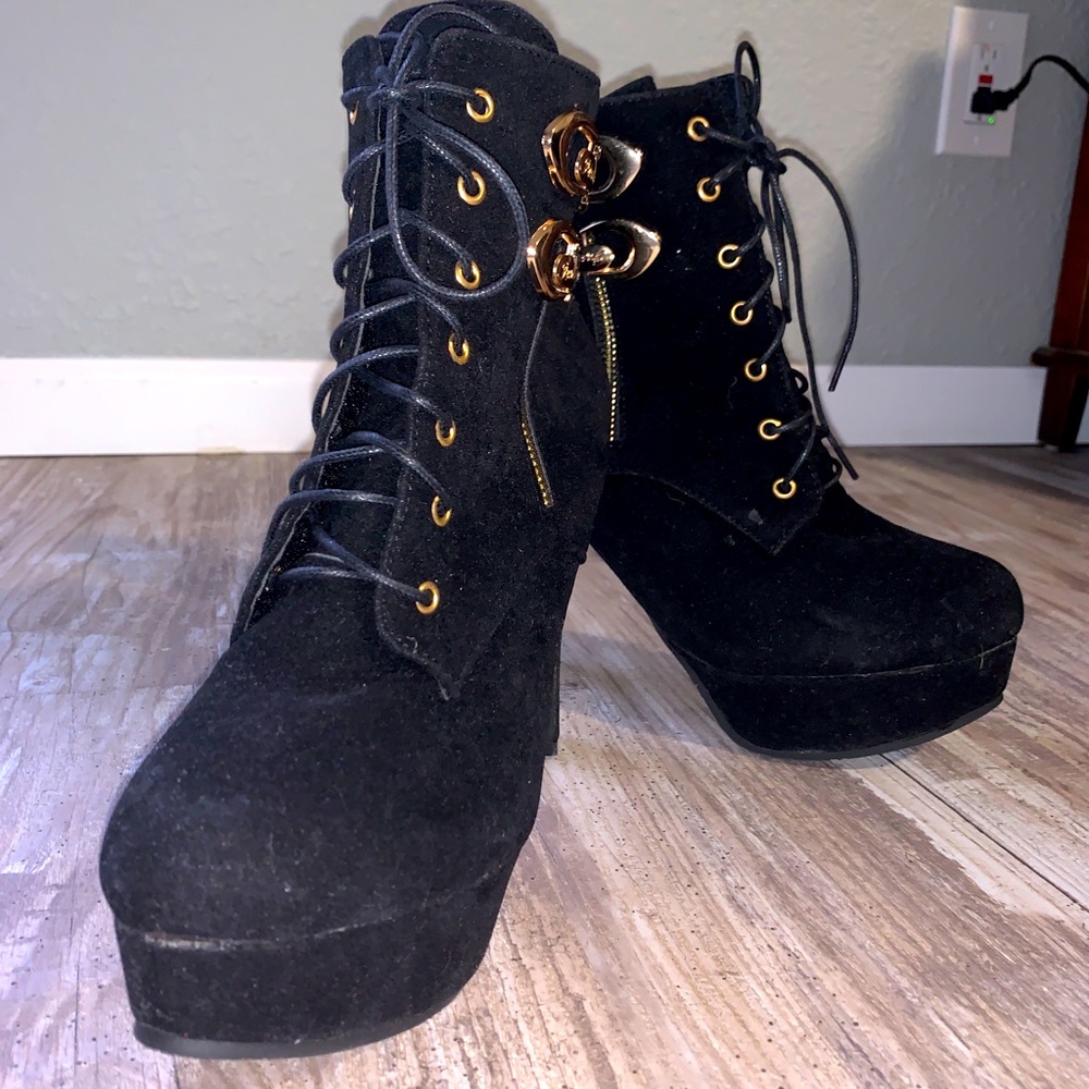 Black tall heeled boots